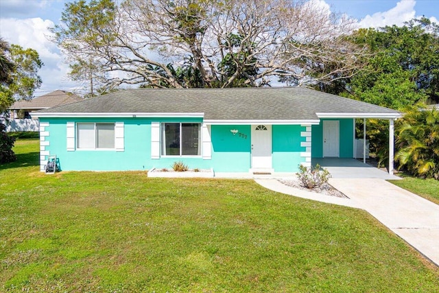 single story home featuring a front yard and a carport