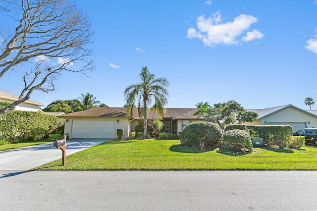 ranch-style home with a garage and a front yard