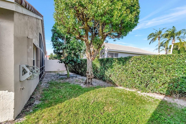 view of yard with a fenced backyard