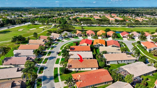 birds eye view of property with a residential view