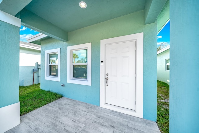 doorway to property with a deck