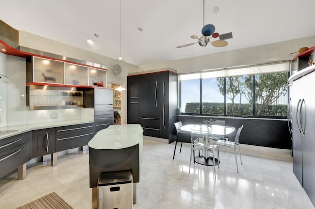 kitchen with paneled refrigerator and ceiling fan