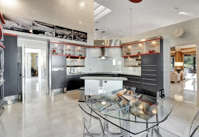 dining space featuring sink