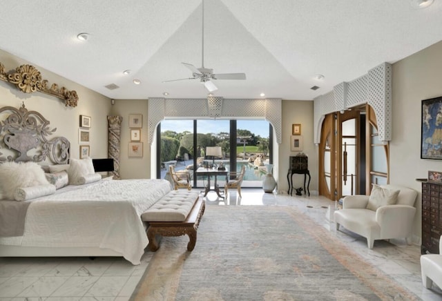 bedroom featuring ceiling fan, access to outside, and a textured ceiling