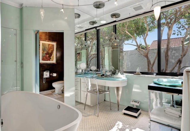 bathroom featuring a tub to relax in