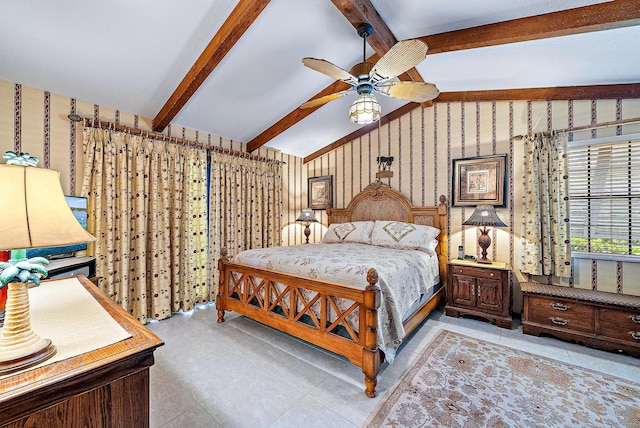 bedroom featuring lofted ceiling with beams and ceiling fan