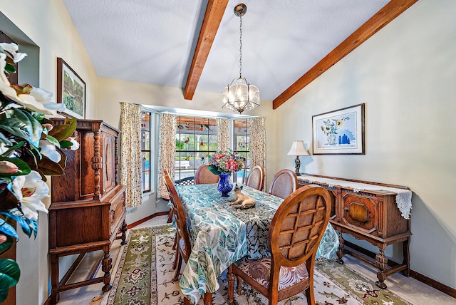 dining space featuring an inviting chandelier, a textured ceiling, and vaulted ceiling with beams