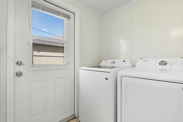 washroom with separate washer and dryer