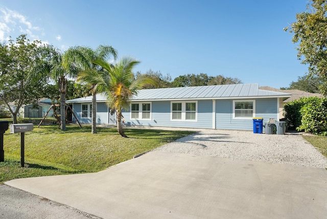 ranch-style home with a front yard