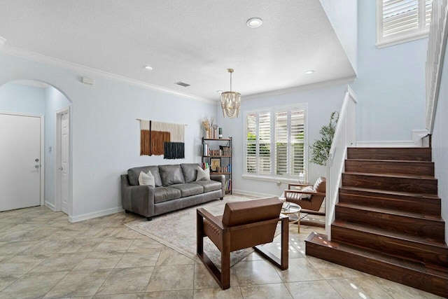 living area featuring stairs, crown molding, visible vents, and arched walkways