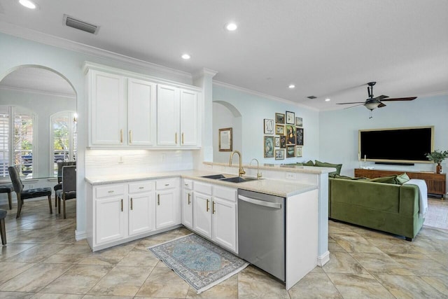 8877 Kettle Drum Ter, Boynton Beach, FL 33473 - kitchen featuring dishwasher, a sink, arched walkways, crown molding, and a ceiling fan