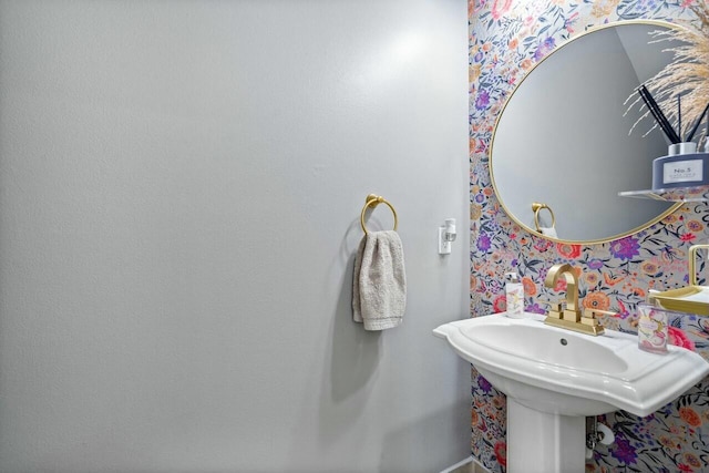 8877 Kettle Drum Ter, Boynton Beach, FL 33473 - bathroom featuring baseboards and wallpapered walls