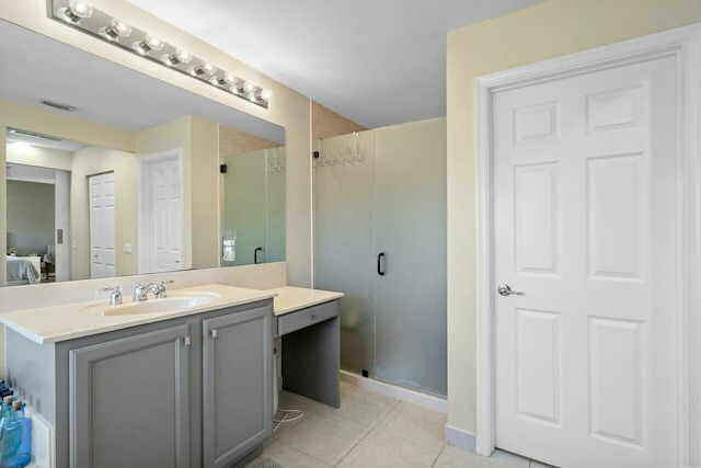 bathroom with vanity, visible vents, ensuite bath, a shower stall, and tile patterned floors