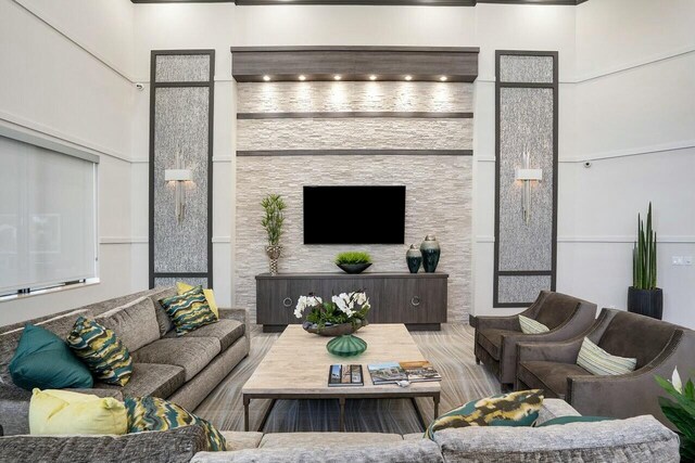 living room with a high ceiling