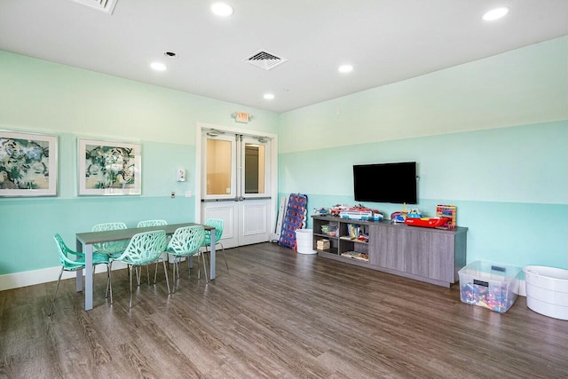 game room featuring recessed lighting, wood finished floors, visible vents, and baseboards