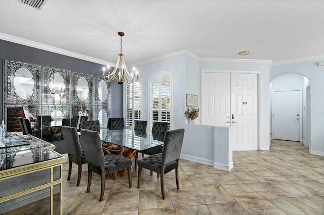 dining area featuring a notable chandelier and crown molding