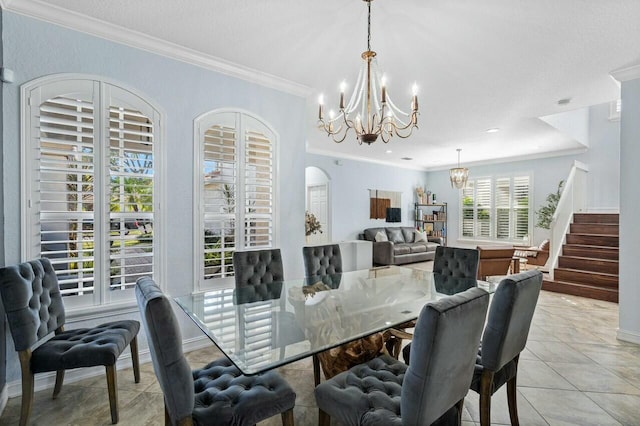 dining room with stairway, light tile patterned floors, an inviting chandelier, arched walkways, and crown molding