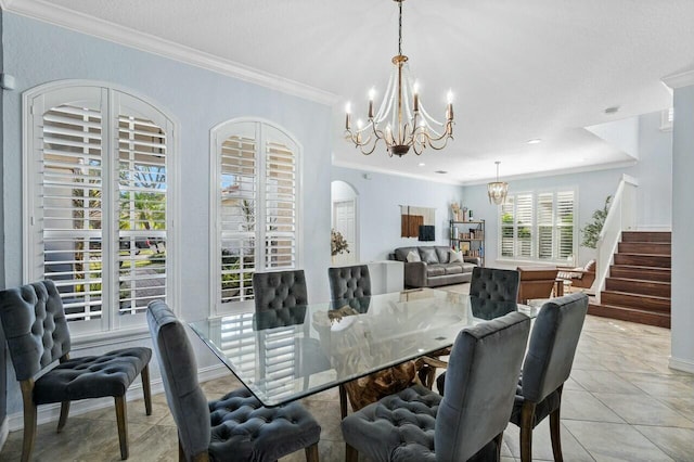 8877 Kettle Drum Ter, Boynton Beach, FL 33473 - dining area featuring light tile patterned floors, ornamental molding, a chandelier, and stairway
