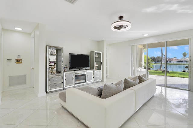 living room with light tile patterned floors