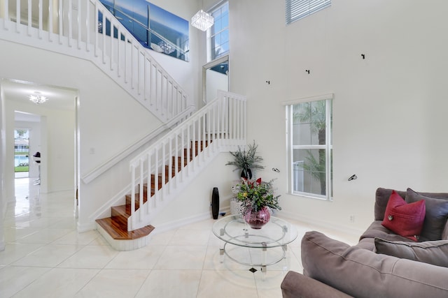 tiled living room with a high ceiling