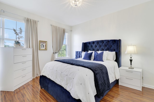 bedroom featuring wood-type flooring