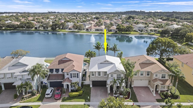 drone / aerial view featuring a water view