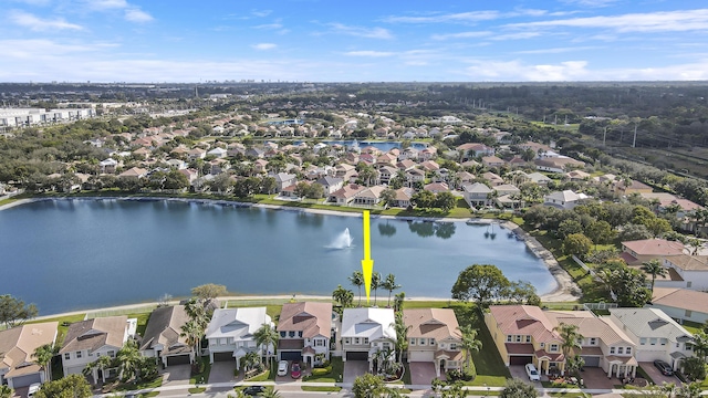 drone / aerial view with a water view