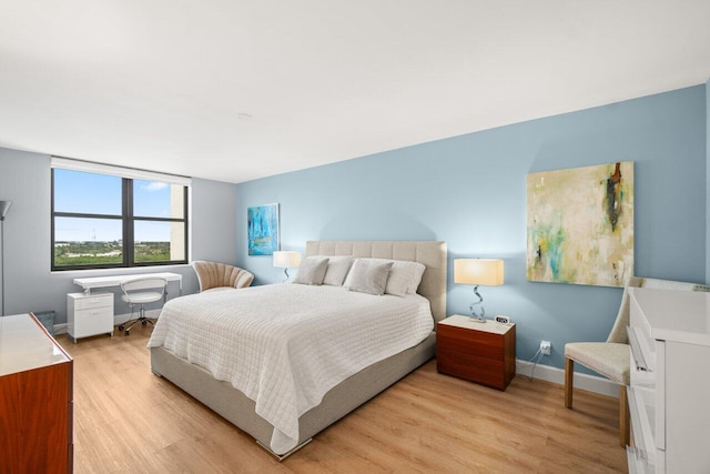 bedroom featuring light hardwood / wood-style flooring