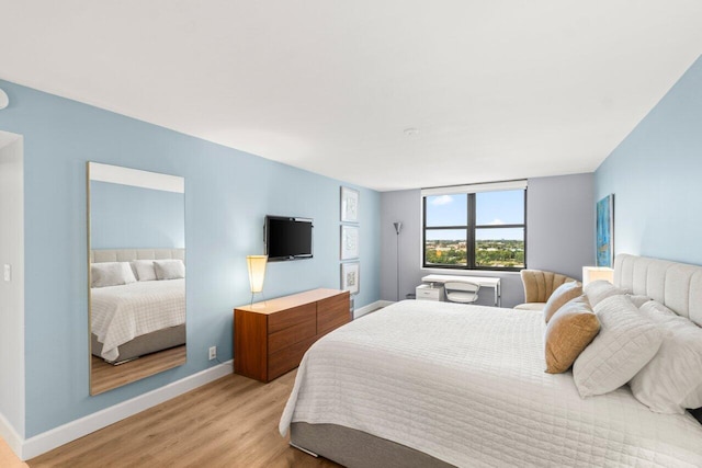 bedroom featuring light wood-type flooring