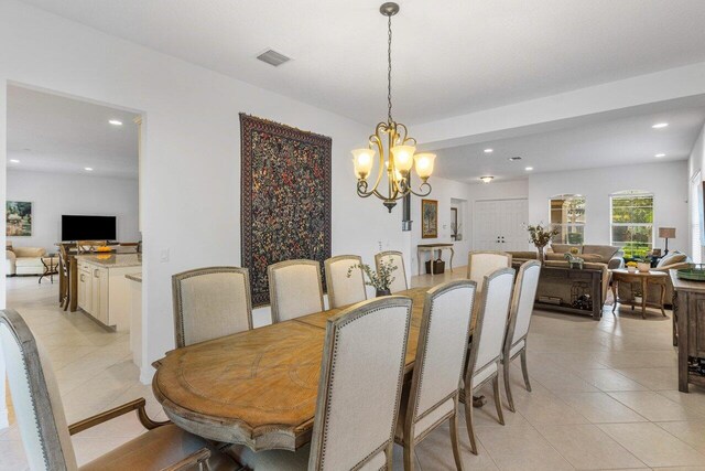8187 Mariano Falls Ln, Boynton Beach, FL 33473 - dining area with visible vents, recessed lighting, an inviting chandelier, and light tile patterned floors