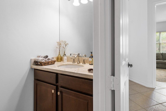 bathroom with vanity and tile patterned floors