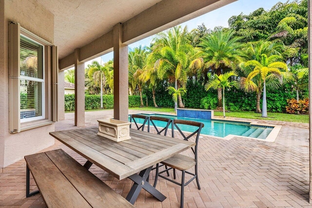 view of pool featuring a patio area and pool water feature