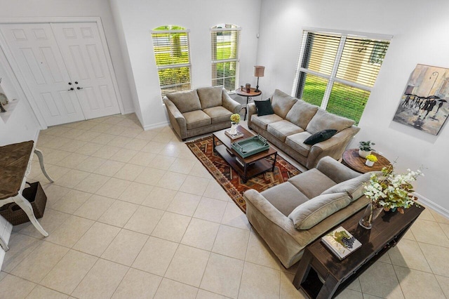 living room with light tile patterned flooring