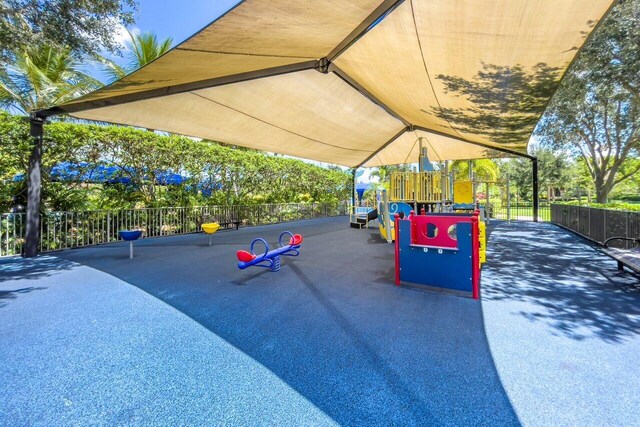 8187 Mariano Falls Ln, Boynton Beach, FL 33473 - community jungle gym with fence