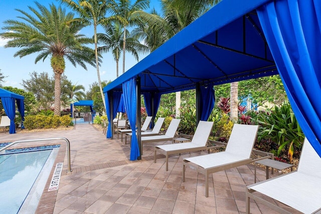 8187 Mariano Falls Ln, Boynton Beach, FL 33473 - view of patio / terrace with a gazebo and a community pool