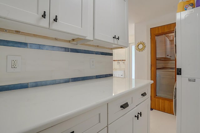 interior details featuring white refrigerator