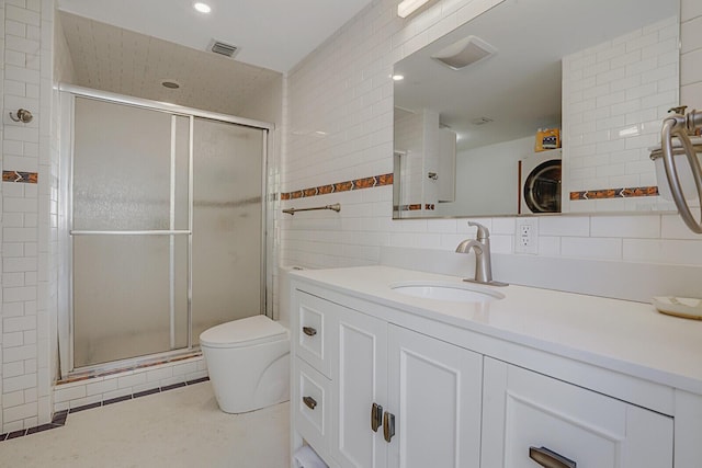 bathroom with walk in shower, toilet, tasteful backsplash, tile walls, and vanity