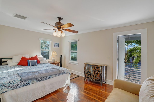 bedroom featuring hardwood / wood-style floors, crown molding, access to outside, and ceiling fan