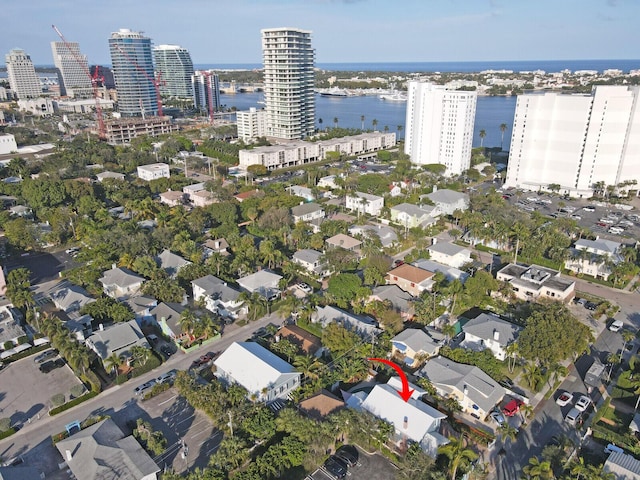 birds eye view of property featuring a water view