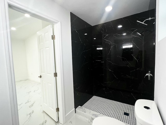 bathroom featuring marble finish floor, a marble finish shower, recessed lighting, toilet, and baseboards