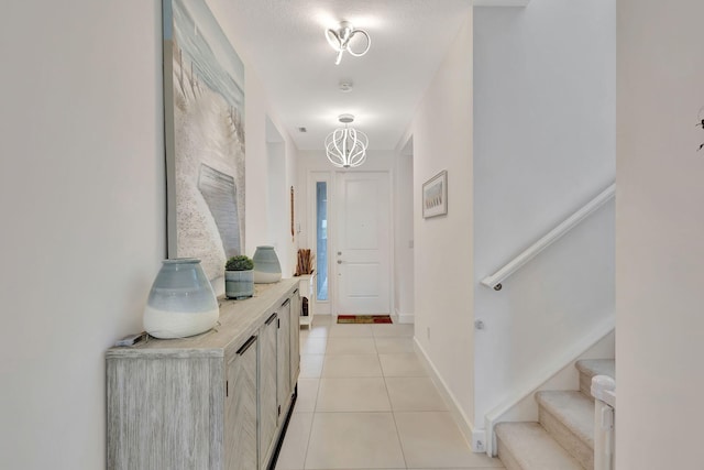 interior space featuring light tile patterned flooring