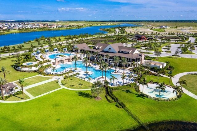 birds eye view of property featuring a water view