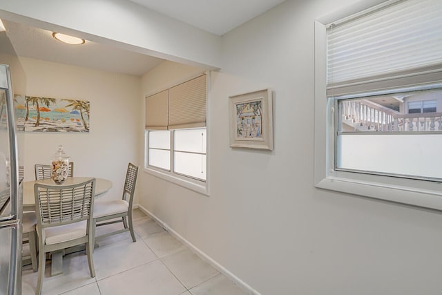 dining room featuring light tile patterned flooring