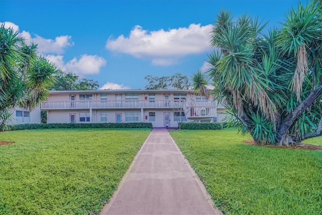 view of front of house with a front lawn