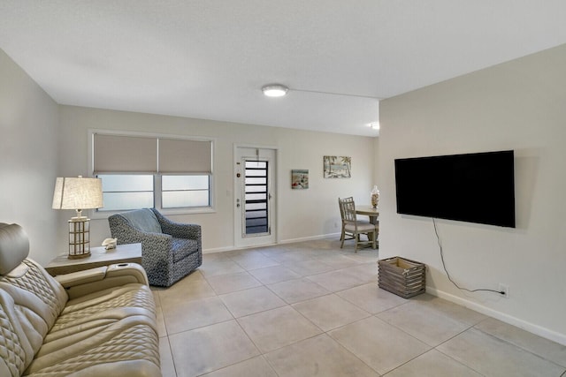 living room with light tile patterned floors