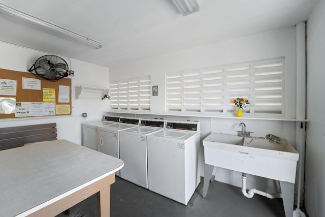 laundry area with washing machine and dryer