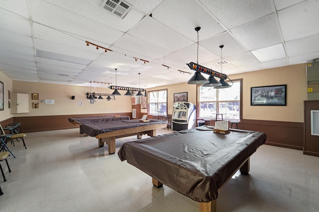 rec room featuring a paneled ceiling, billiards, and wood walls