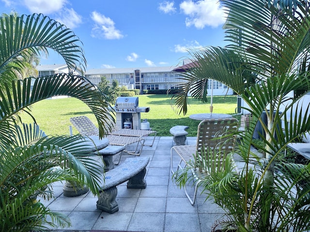 view of patio with a grill