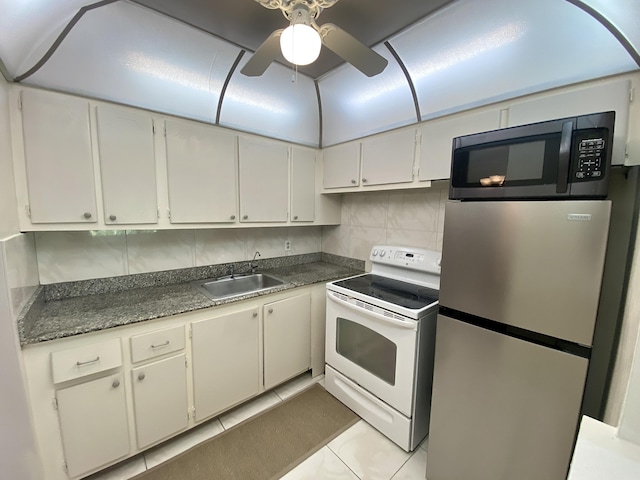 kitchen featuring sink, ceiling fan, appliances with stainless steel finishes, white cabinets, and decorative backsplash