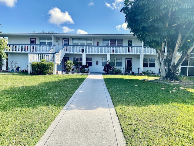 view of front of house with a front lawn